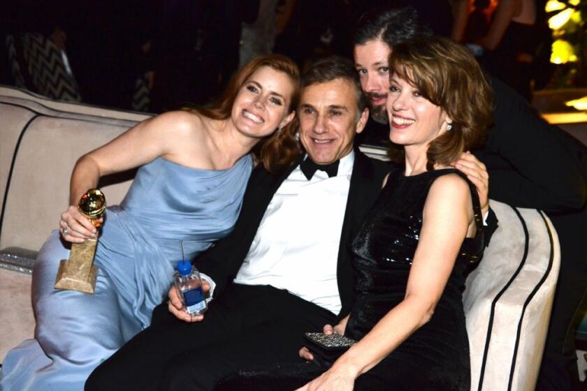 Those in attendance at a 2015 Golden Globes after-party hosted by Weinstein Co. and Netflix included, from left, Amy Adams, Christoph Waltz, Darren Le Gallo and Judith Holste.