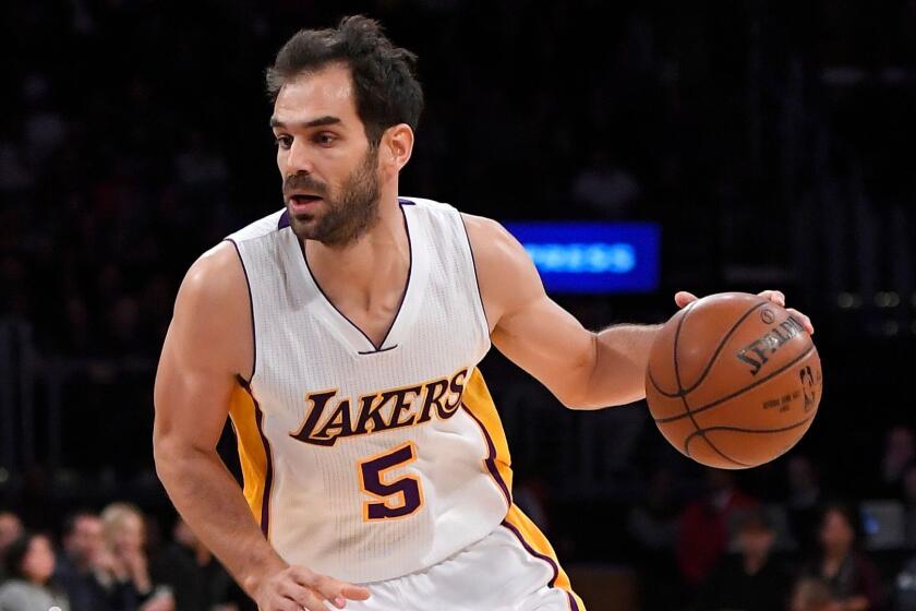 Los Angeles Lakers guard Jose Calderon of Spain drives toward the basket during the first half of an NBA basketball game Nov. 27 in Los Angeles.