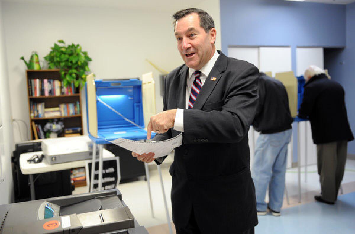 Rep. Joe Donnelly, Indiana Democratic candidate for U.S. Senate, casts his vote in South Bend, Ind.