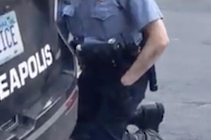 In this Monday, May 25, 2020, frame from video provided by Darnella Frazier, a Minneapolis officer kneels on the neck of a handcuffed man who was pleading that he could not breathe in Minneapolis. Four Minneapolis officers involved in the arrest of a George Floyd who died in police custody were fired Tuesday. (Darnella Frazier via AP)