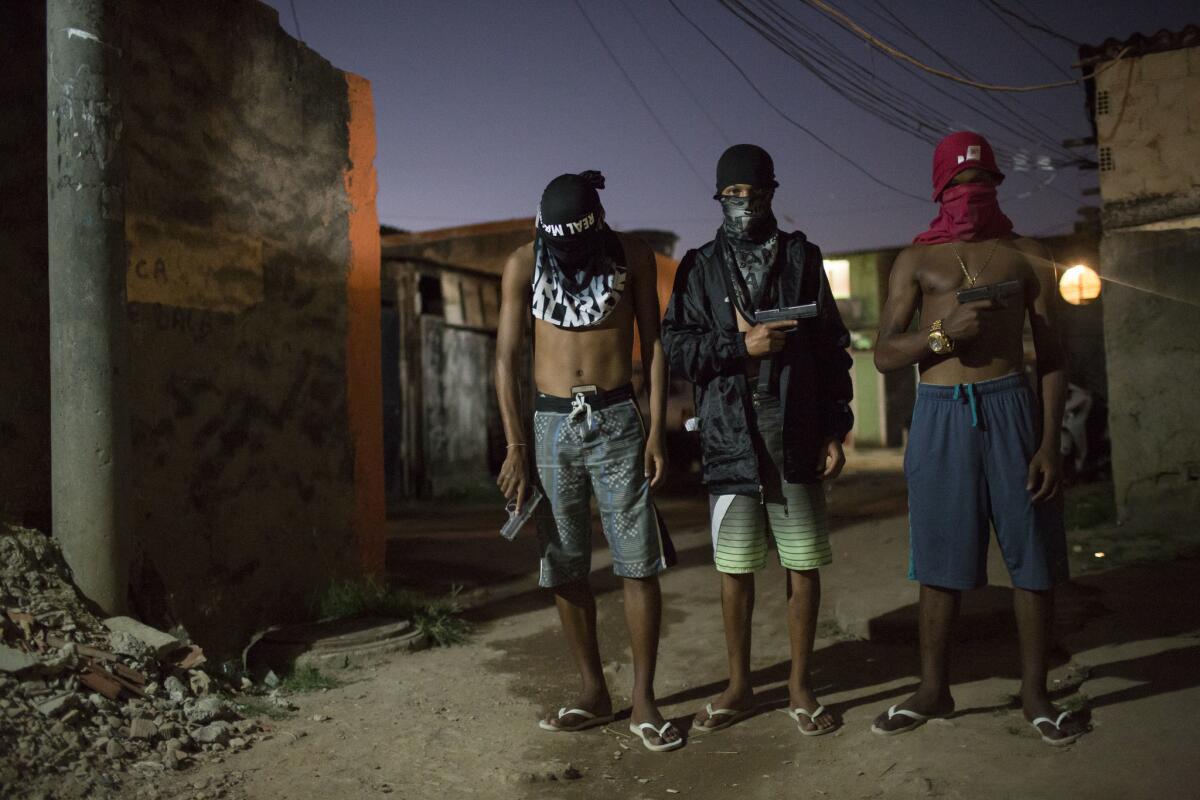 Young drug traffickers in a slum in Rio de Janeiro.
