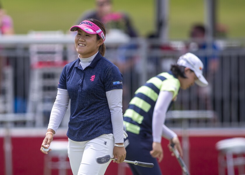Nasa Hataoka reacts on the 18th hole during the first round of the Meijer LPGA Classic golf tournament at the Blythefield Country Club in Belmont, Mich., Thursday, June 17, 2021. (Cory Morse/The Grand Rapids Press via AP)