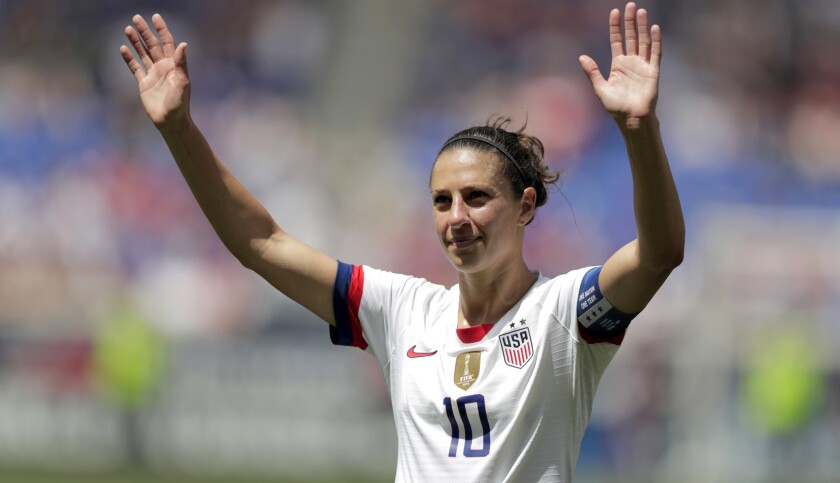 American midfielder Carli Lloyd acknowledges fans during a World Cup send-off ceremony before an exhibition game against Mexico on May 26.