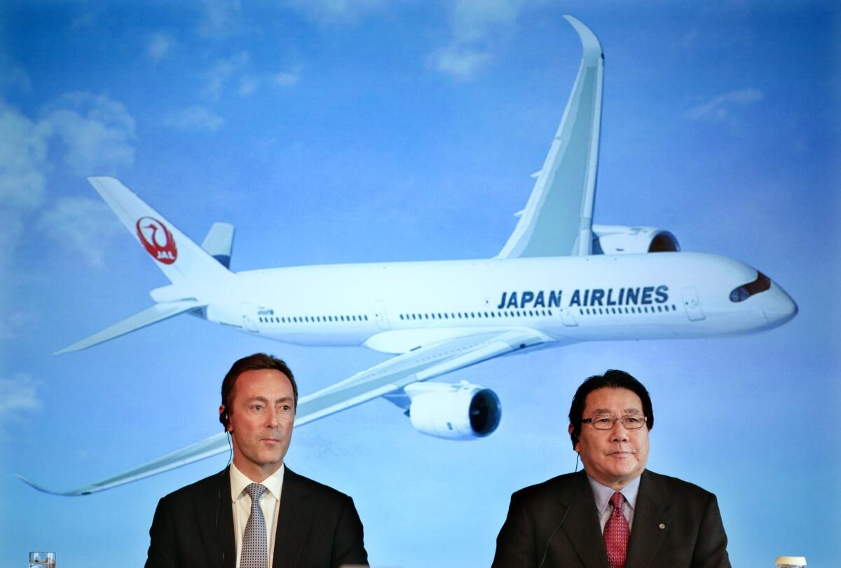 Japan Airlines announced Monday it would order 31 jets from Airbus in a deal worth $9.5 billion. Above, Yoshiharu Yeki, president of Japan Airlines, and Fabrice Bregier, chief executive of Airbus, announce the purchase at a news conference in Tokyo.