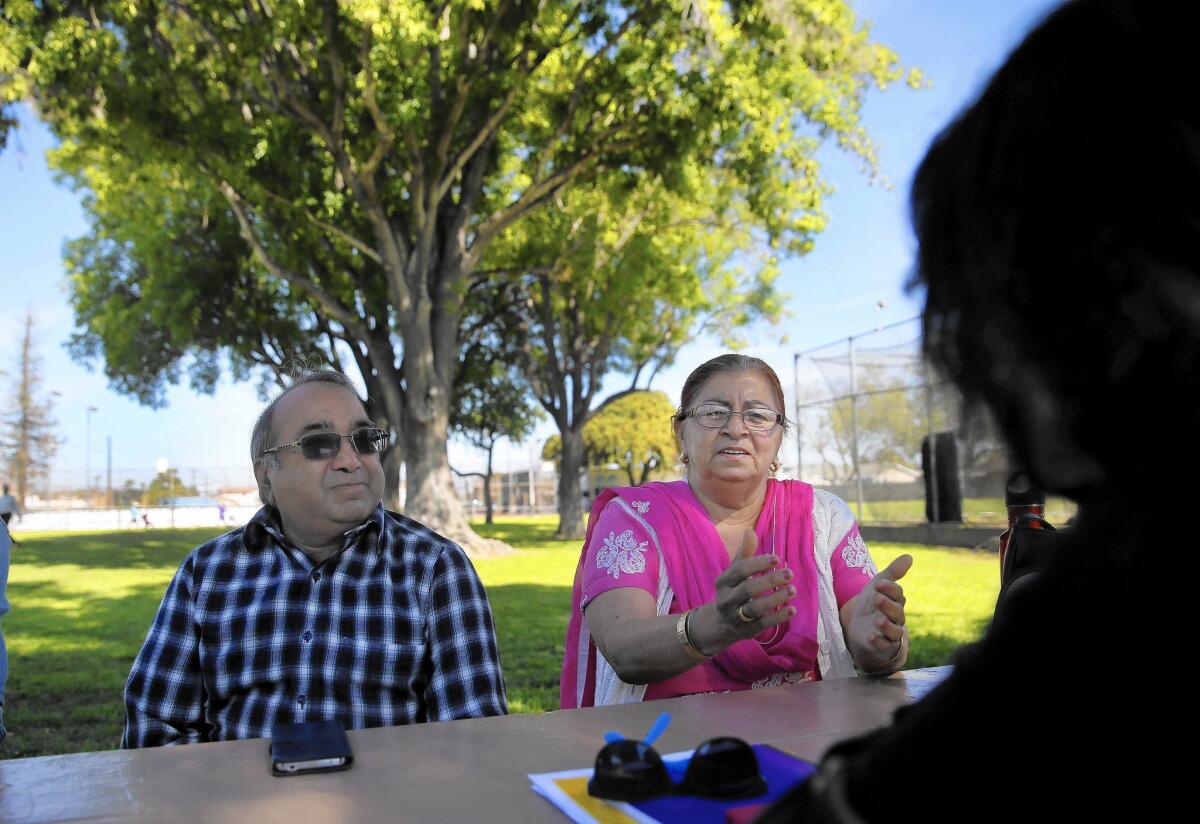 South Asian seniors Dinesh Shah, left, and Sital Kaur learn about eating healthier at the Oliver Little Community Center in Artesia. Asian Americans are at higher risk of diabetes than other people.