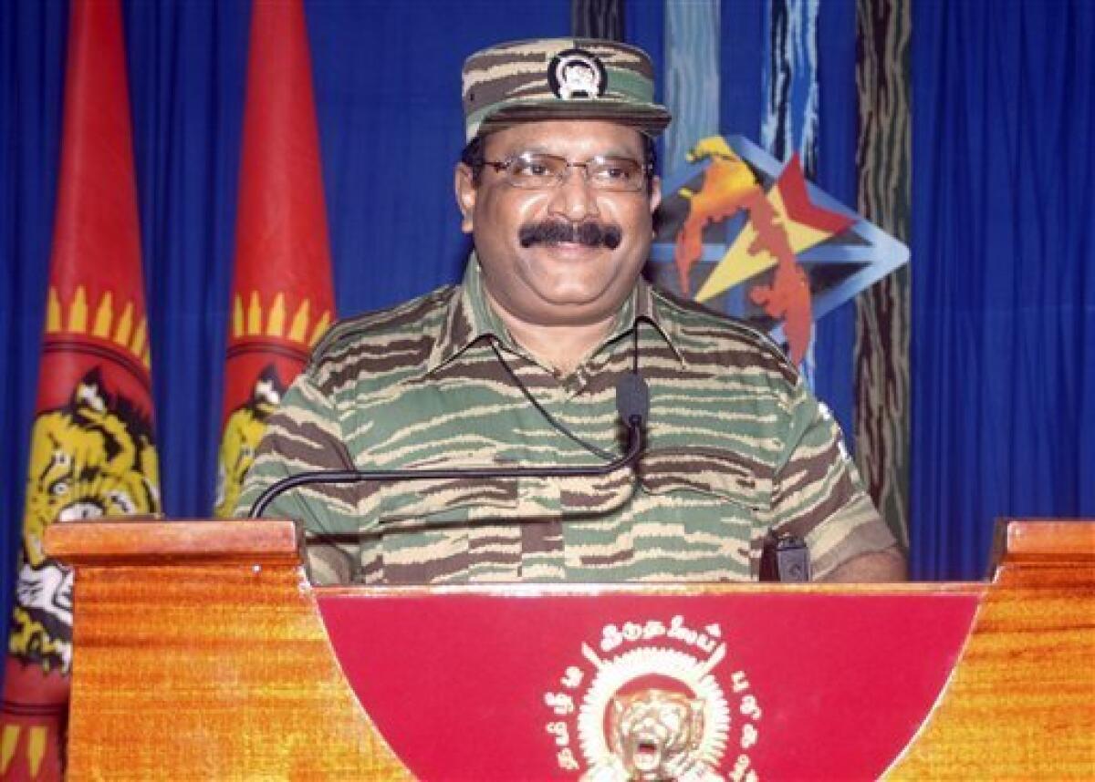 In this Nov. 27, 2008, photo made available by Liberation Tigers of Tamil Eelam (LTTE), reclusive Tamil Tiger leader Velupillai Prabhakaran addresses his annual address to Sri Lanka's Tamil minority at an undisclosed location near Colombo, Sri Lanka. Prabhakaran, 54, transformed the Liberation Tigers of Tamil Eelam from a group of barefoot soldiers into a guerrilla force that not only held off the Sri Lankan army for years but also drove off the Indian army. (AP Photo/Liberation Tigers of Tamil Eelam, File)