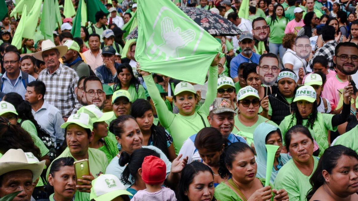Supporters attend a National Union of Hope rally June 14 in Guatemala City.