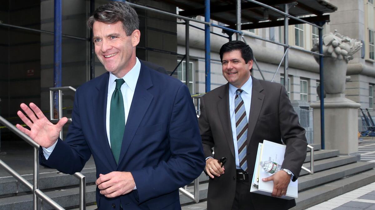 Bill Baroni, left, a former loyalist to New Jersey Gov. Chris Christie, is on trial over the traffic jam scandal that helped doom Christie's political future. At right is his attorney Michael Baldassa