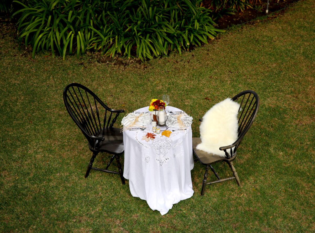 An outdoor table set for two