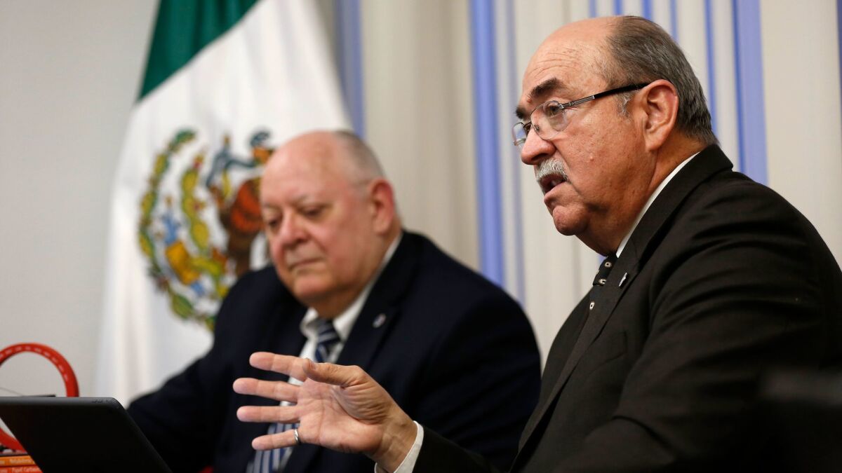 Roberto Salmon, Mexican Commisisoner of the International Boundary and Water Commission (USIBWC), at left, and U.S. Commissioner Edward Drusina are shown during a meeting in San Diego on March 5, 2018.