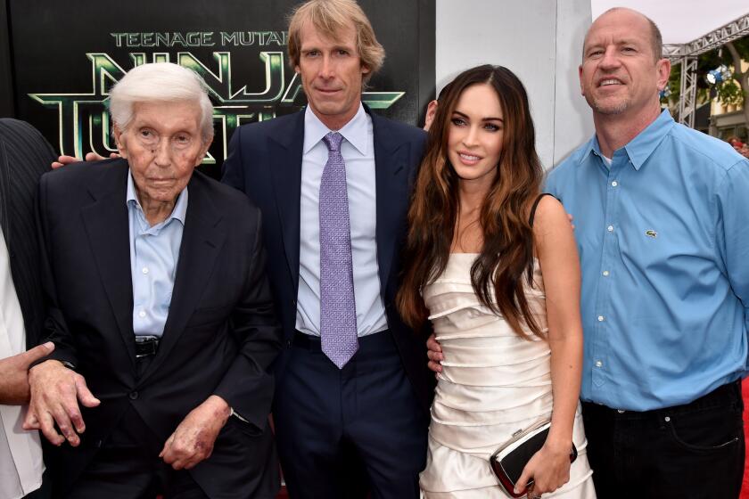 Attorneys for Sumner Redstone on Monday filed a motion asking that a lawsuit brought by Viacom CEO Philippe Dauman in Massachusetts be dismissed. Redstone with Michael Bay, Megan Fox and Rob Moore of Paramount Pictures at a 2014 movie premiere in Westwood.