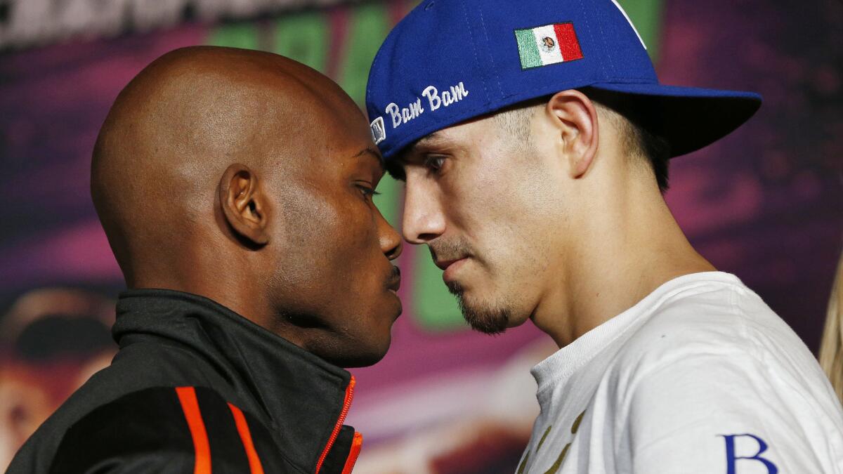 Timothy Bradley, left, and Brandon Rios go nose to nose after their weigh-in on Friday in Las Vegas.