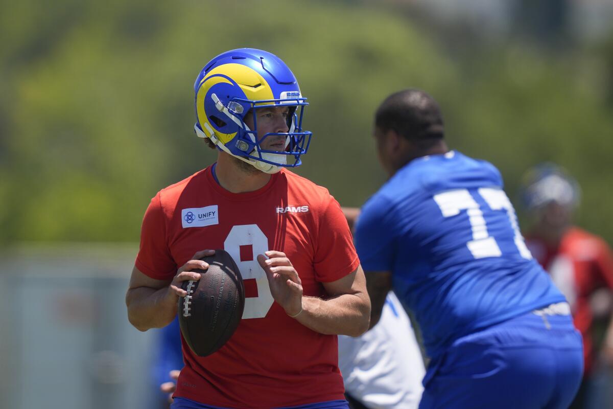 Rams quarterback Matthew Stafford stretches during an OTA practice at Cal Lutheran University.