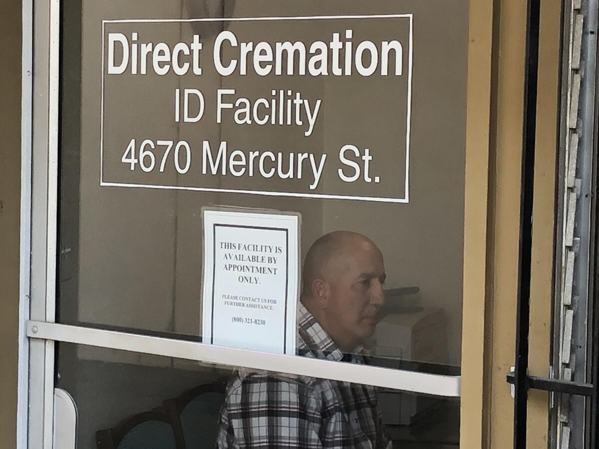 Michael Serna waits inside a Kearny Mesa crematory 