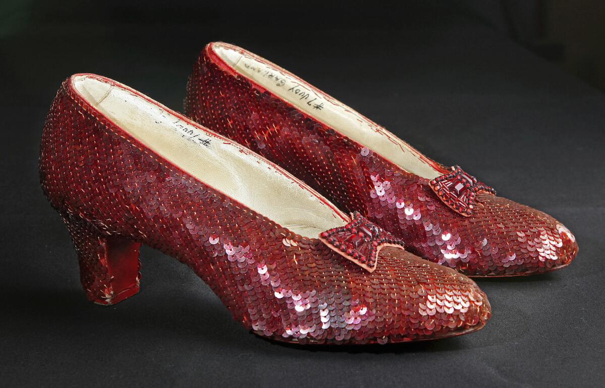 This 2001 photo shows the sequin-covered ruby slippers worn by Judy Garland in "The Wizard of Oz." Smithsonian Museum officials started a Kickstarter fundraising drive Oct. 17 to conserve the deteriorating shoes.