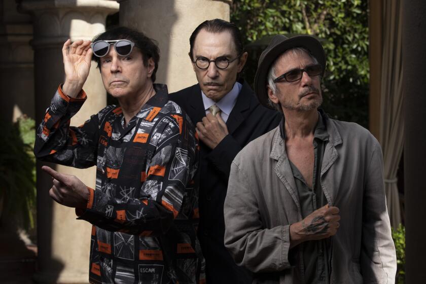 LOS ANGELES, CA - AUGUST 10: Singer-songwriters Russell, left, and Ron Mael of "Sparks," and French filmmaker Leos Carax, right, wrote the new musical film "Annette," starring Adam Driver and Marion Cotillard, for which Carax just won best director at the Cannes Film Festival. Photographed at Chateau Marmont on Tuesday, Aug. 10, 2021 in Los Angeles, CA. (Myung J. Chun / Los Angeles Times)