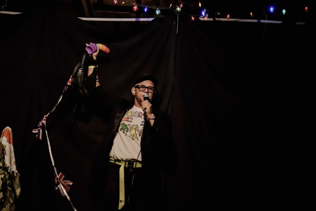 7G celebrates Pride with British flags and a rainbow dildo onstage at Chain of Fools.