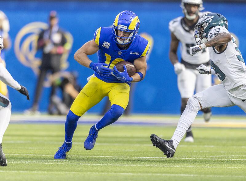 Cooper Kupp runs with the ball past Philadelphia Eagles defenders in the second half.