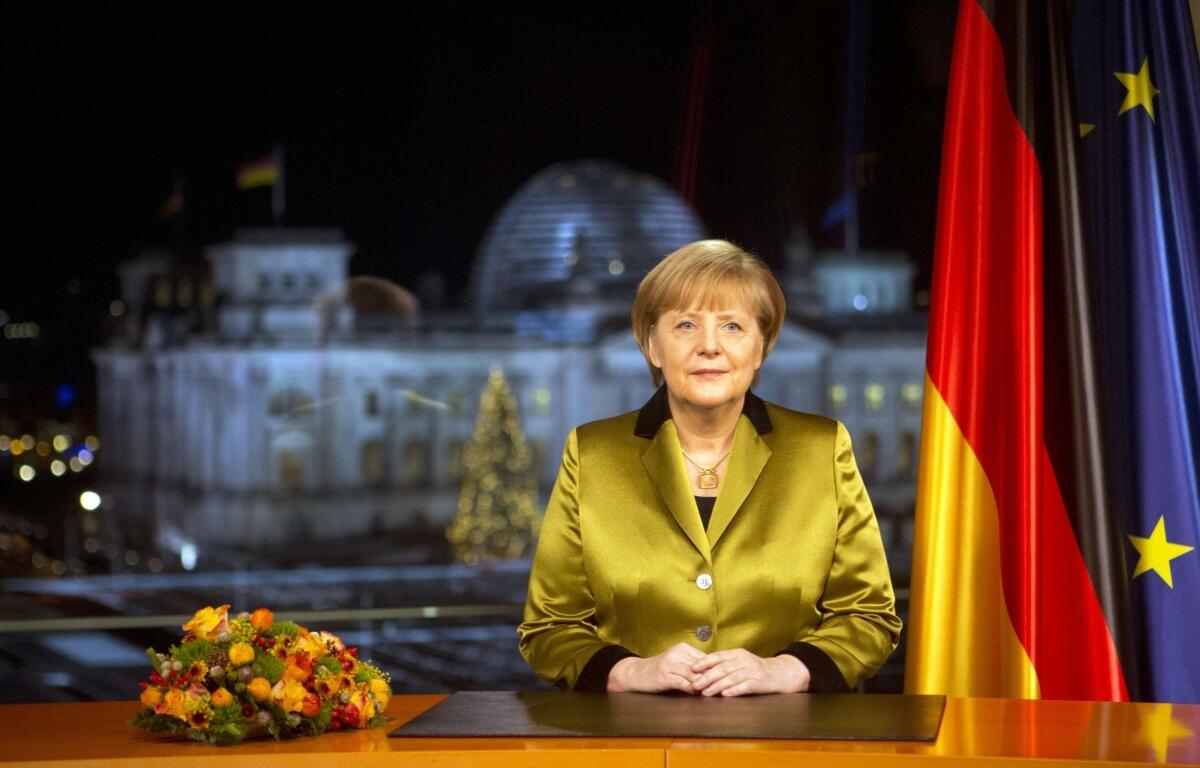 German Chancellor Angela Merkel, seen here taping her New Year's Day address, returned to Berlin from her annual holiday ski vacation in Switzerland on Dec. 30. What she thought was a bruise suffered during a fall while cross-country skiing was diagnosed on Friday as a pelvic fracture.