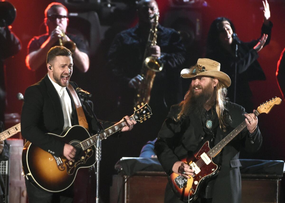 Justin Timberlake, left, and Chris Stapleton perform Wednesday at the 49th annual CMA Awards in Nashville.