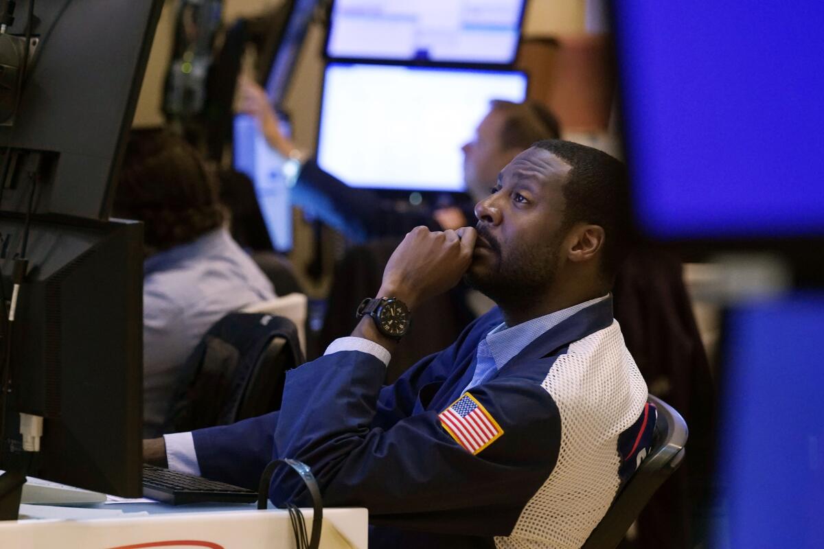 A trader on the floor of the New York Stock Exchange.