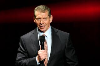 WWE Chairman and CEO Vince McMahon speaks at a news conference announcing the WWE Network in 2014.
