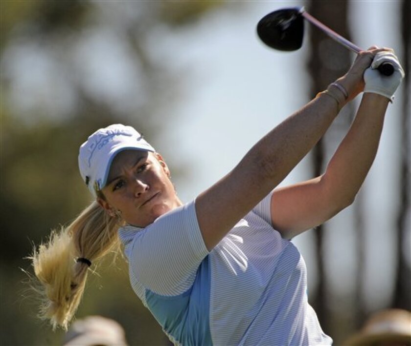 Brittany Lincicome watches her tee shot on the third hole during the final round of the LPGA Kraft Nabisco Championship golf tournament in Rancho Mirage, Calif., Sunday, April 5, 2009. (AP Photo/Chris Carlson)