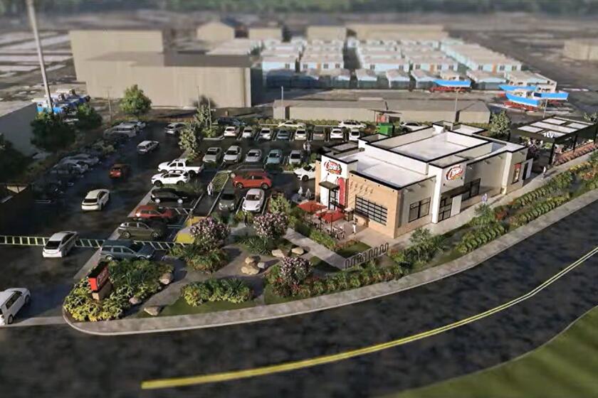A photo simulation shows a proposal for a Raising Cane's fast food chicken restaurant at 1595 Old Newport Blvd.