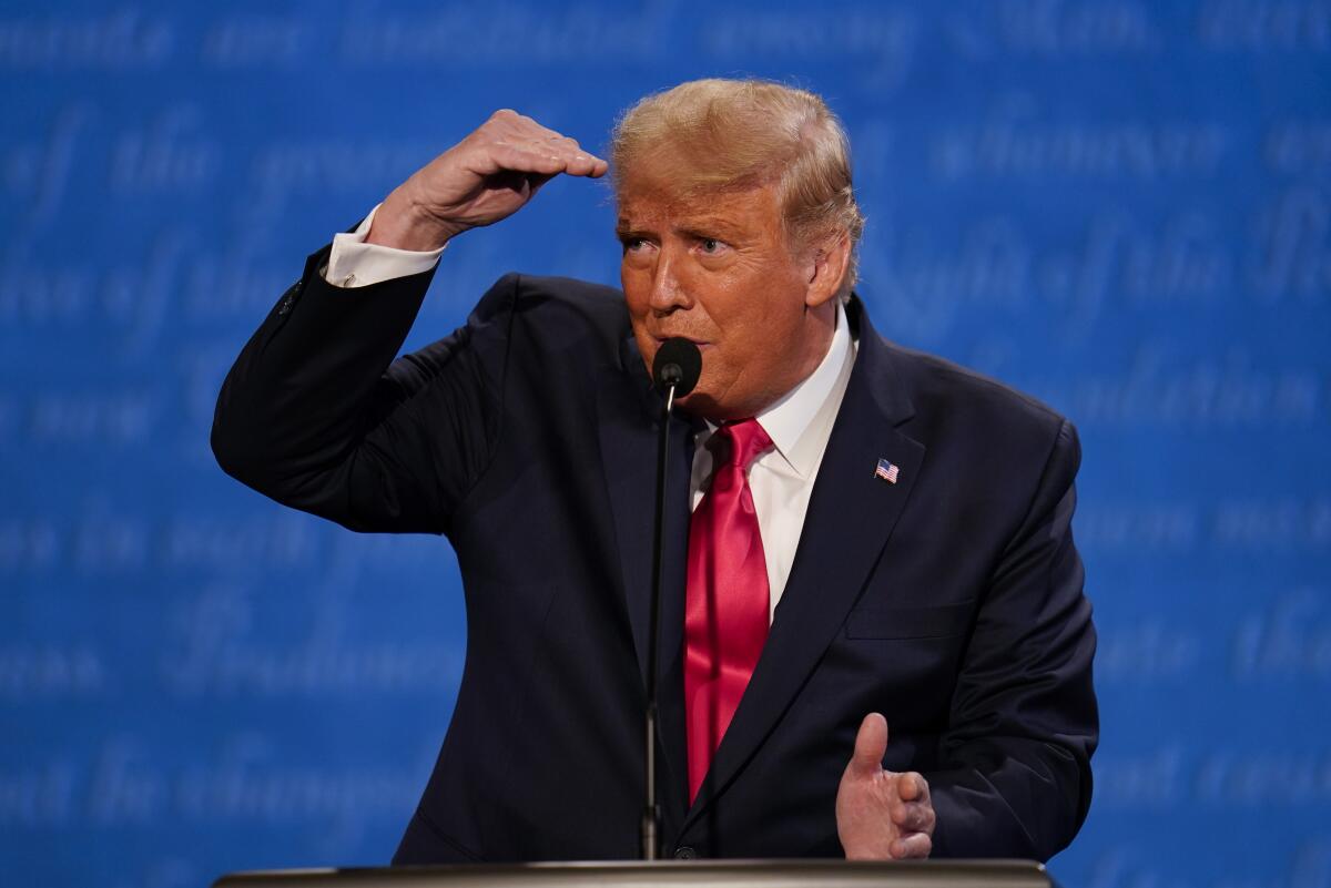 President Trump peers at the audience during the second presidential debate Thursday in Nashville, Tenn.