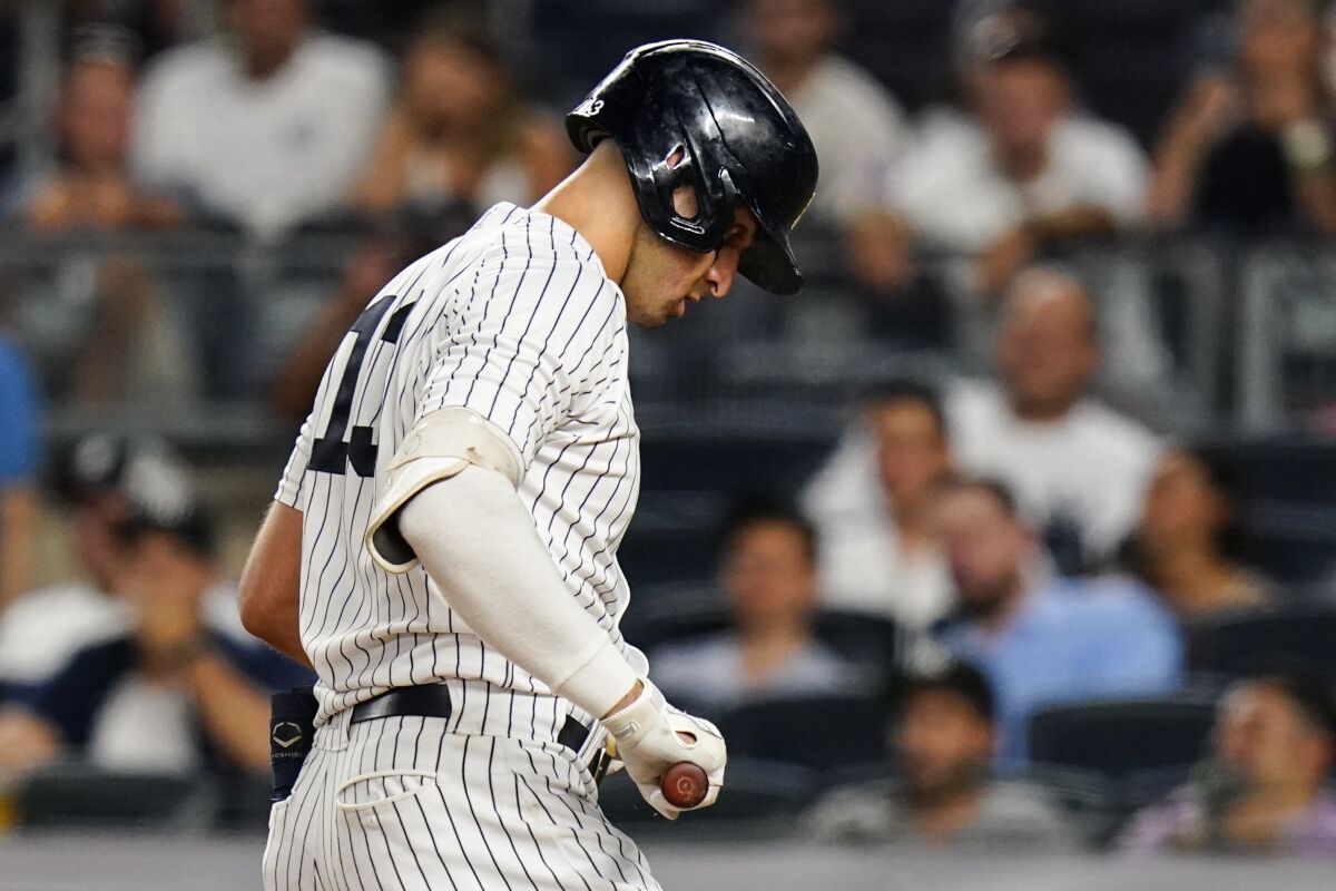 New York Yankees' Joey Gallo reacts after striking out during the fifth inning of the team's baseball game against the Kansas City Royals on Thursday, July 28, 2022, in New York. (AP Photo/Frank Franklin II)