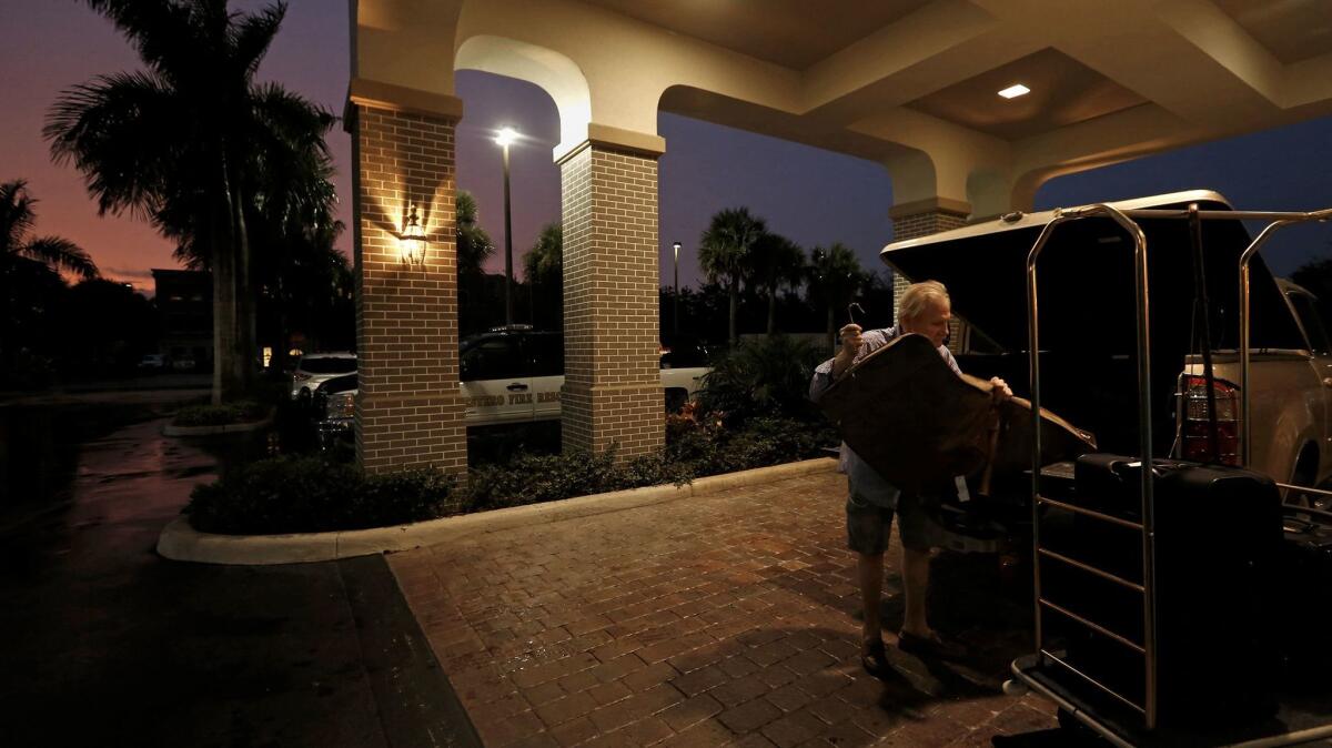 John Hughes of Fort Myers had to evacuate the first hotel he was booked into before moving to the Hampton Inn and Suites.