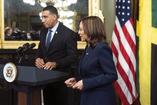 Vice President Kamala Harris and Prime Minister of Jamaica Andrew Holness, conclude their remarks following their meeting at the Eisenhower Executive Office Building on the White House complex, in Washington, Wednesday, March 30, 2022. (AP Photo/Manuel Balce Ceneta)
