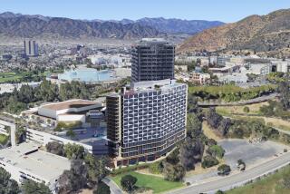 Rendering of a planned 18-story, 395-room addition to the existing 24-story Hilton Universal City Hotel in Universal City.