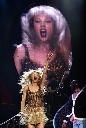 Taylor Swift performs during her "Speak Now" tour at Staples Center.