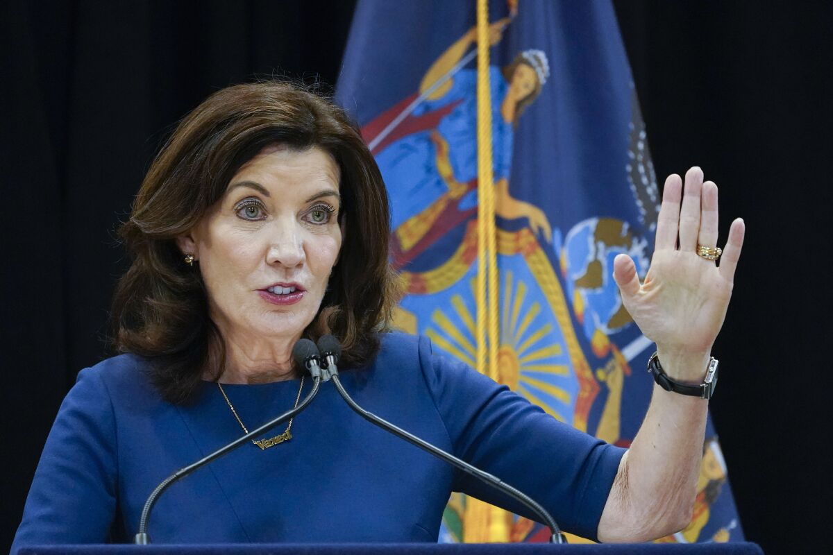 FILE - New York Gov. Kathy Hochul speaks at an event, Friday, Dec. 10, 2021, in New York. Gov. Hochul said she wants New York to impose term limits on her office and other statewide elected officials and ban them from earning an outside income, changes that implicitly rebuke her predecessor Andrew Cuomo, in a statement issued Monday, Jan. 3, 2022. (AP Photo/Mary Altaffer, File)