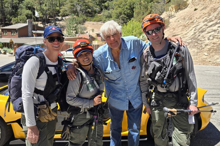 The San Dimas Mountain Rescue Team bumps into Jay Leno while searching for a missing person in the San Gabriel Mountains on Aug. 18, 2024. (San Dimas Mountain Rescue_