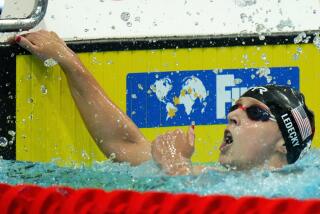 Katie Ledecky of the United States celebrates after winning the Women 1500m Freestyle.