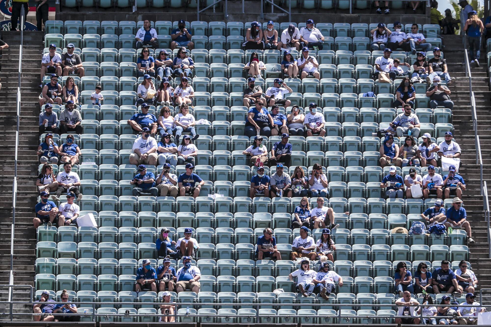 Fans are socially distanced in the upper deck at the Dodgers' home opener at Dodger Stadium.