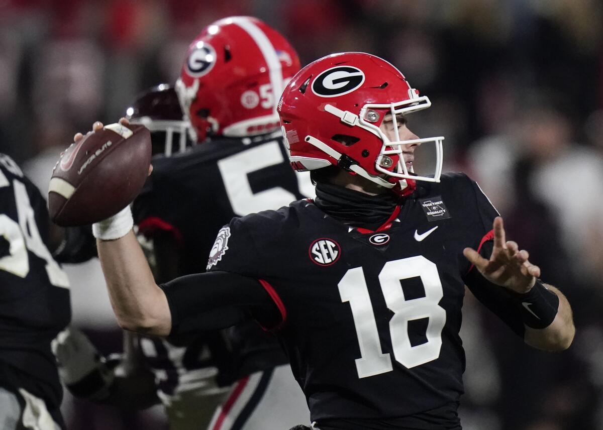 Georgia quarterback JT Daniels passes against Mississippi State on Nov. 21, 2020, in Athens, Ga.