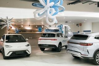 A Dolphin Mini, from left, and other BYD vehicles at a Mexico City showroom. Photographer: Jeoffrey Guillemard/Bloomberg
