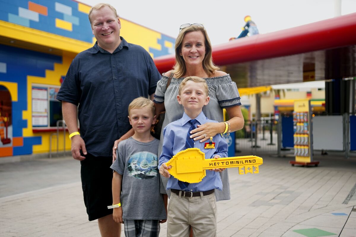 James (front row, right) the new Mayor of Legoland California, on July 25 with his family (l-r) Chris Carlin, Drew Carlin and Beth Carlin