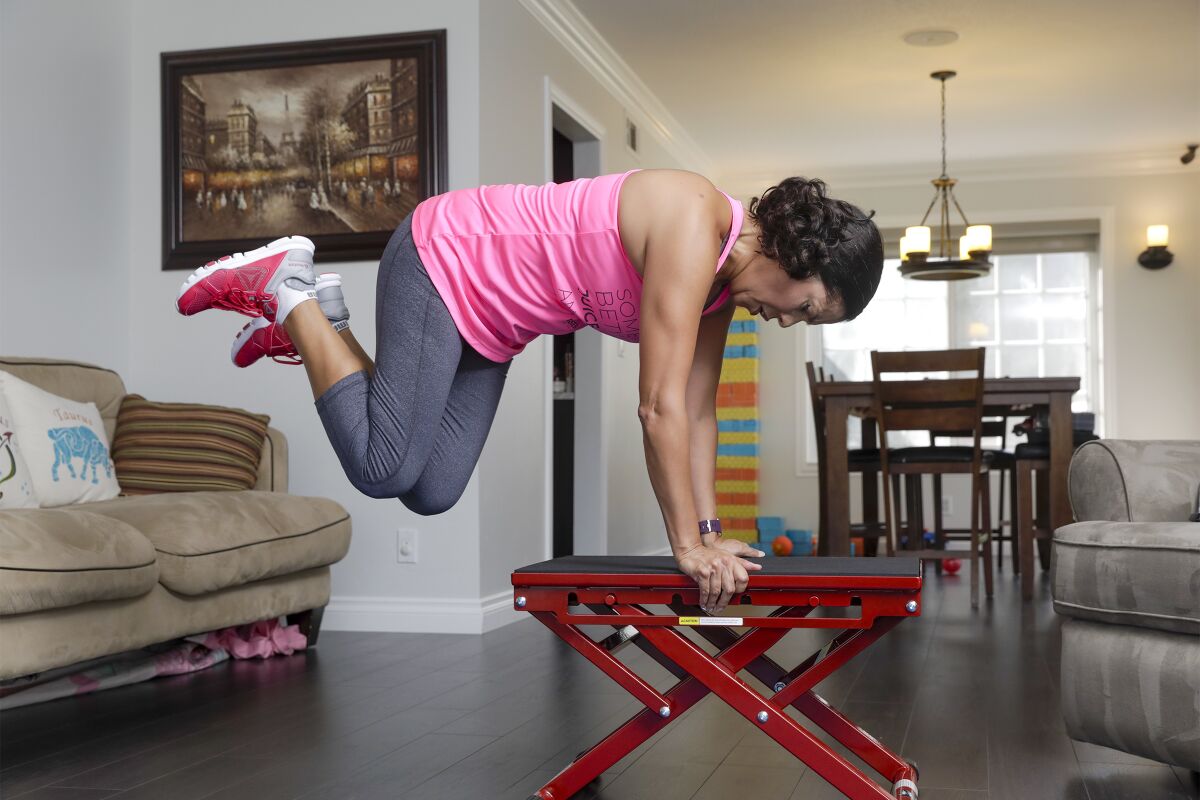 Cynthia Bello typically works out at home using instructional videos.