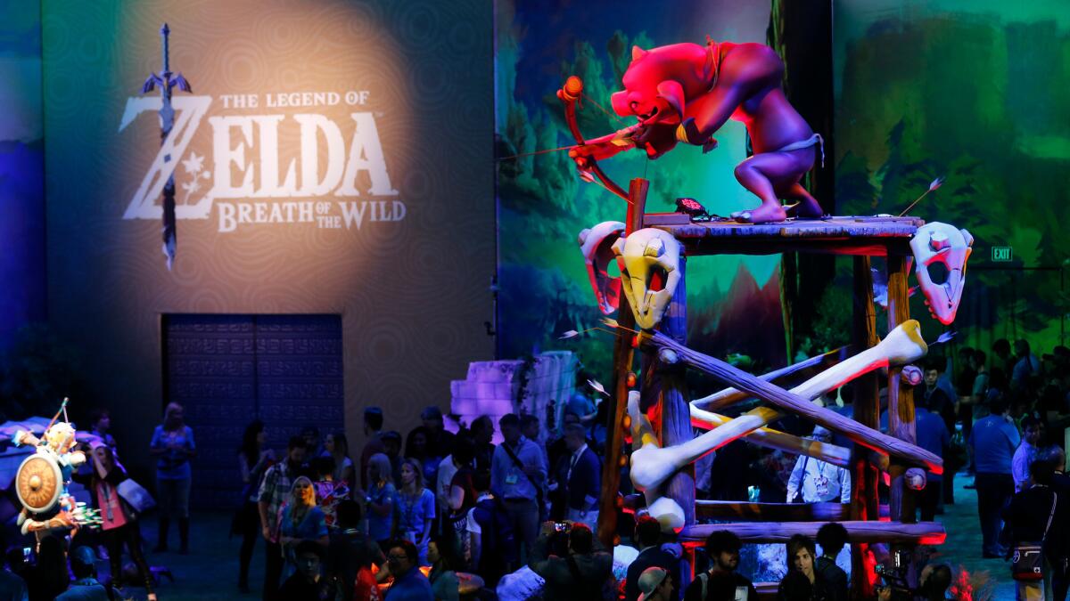Attendees at the Electronic Entertainment Expo check out Nintendo's "The Legend of Zelda: Breath of the Wild."
