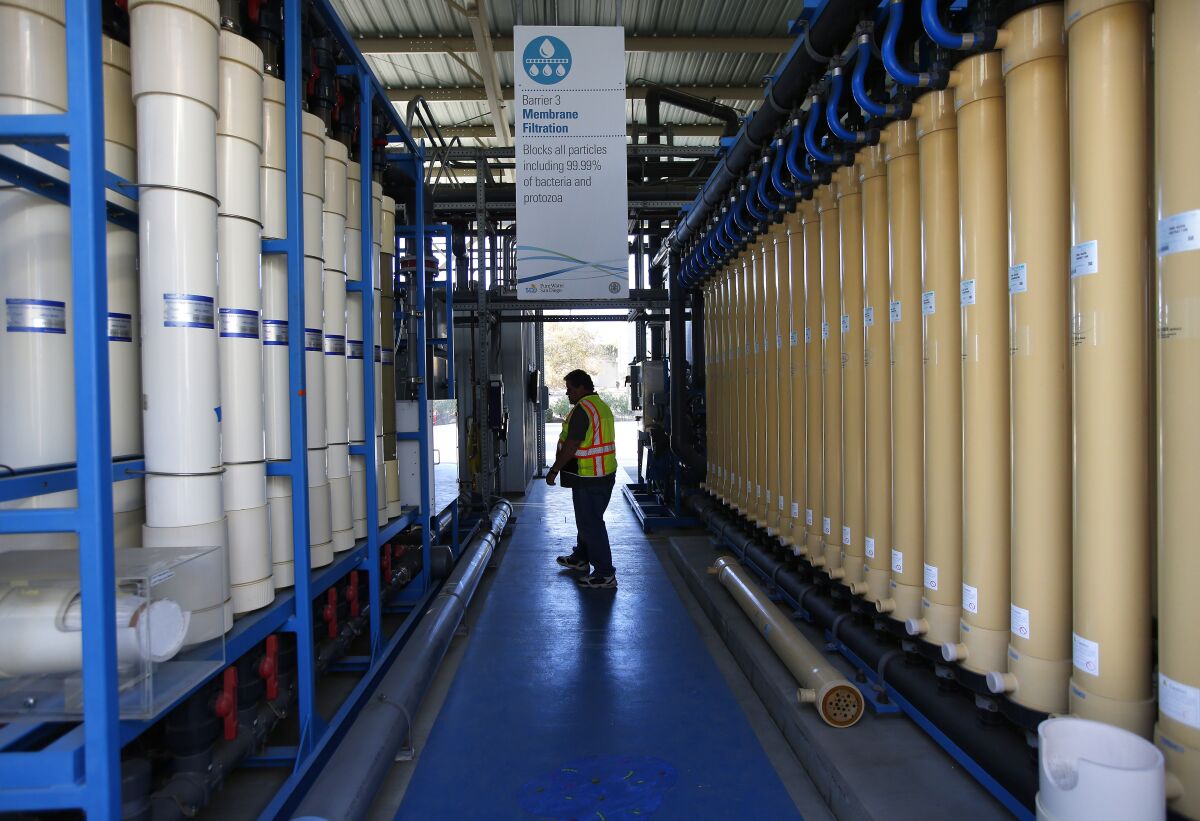 A plant tech supervisor walks through the Pure Water demonstration facility in San Diego last year.