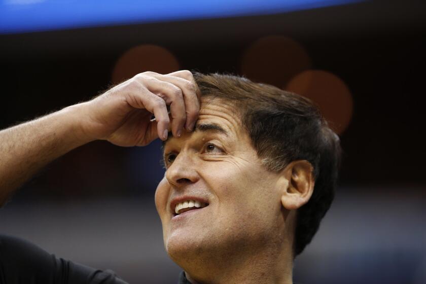 Dallas Mavericks owner and "Shark Tank" cast member Mark Cuban stands on the court before a Mavericks game against the Washington Wizards last month.