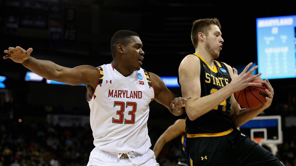 North Carolina State's Jack Clark (5) drives past Austin Peay's