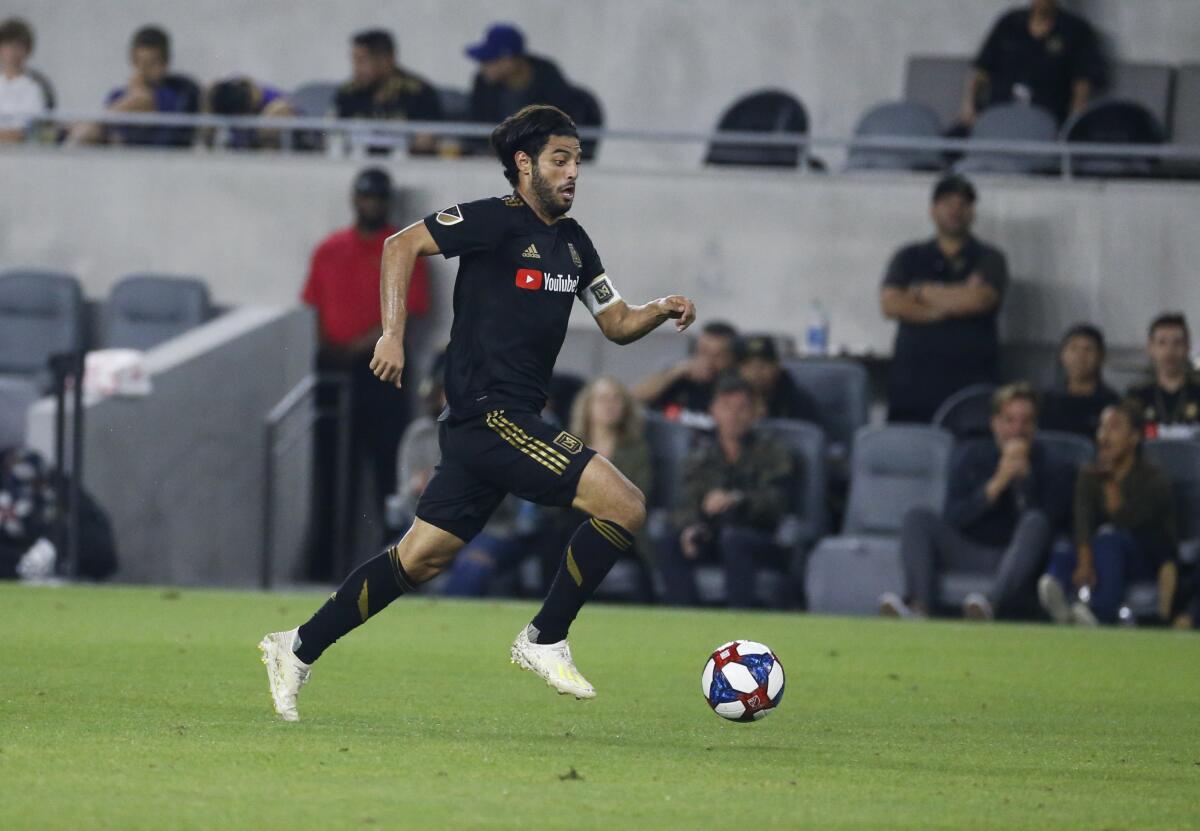 Los Angeles FC forward Carlos Vela (10) in actions during a U.S. Open Cup quarterfinals soccer match between Los Angeles FC and Portland Timbers in Los Angeles, Wednesday, July 10, 2019. The Timbers won 1-0. (AP Photo/Ringo H.W. Chiu)