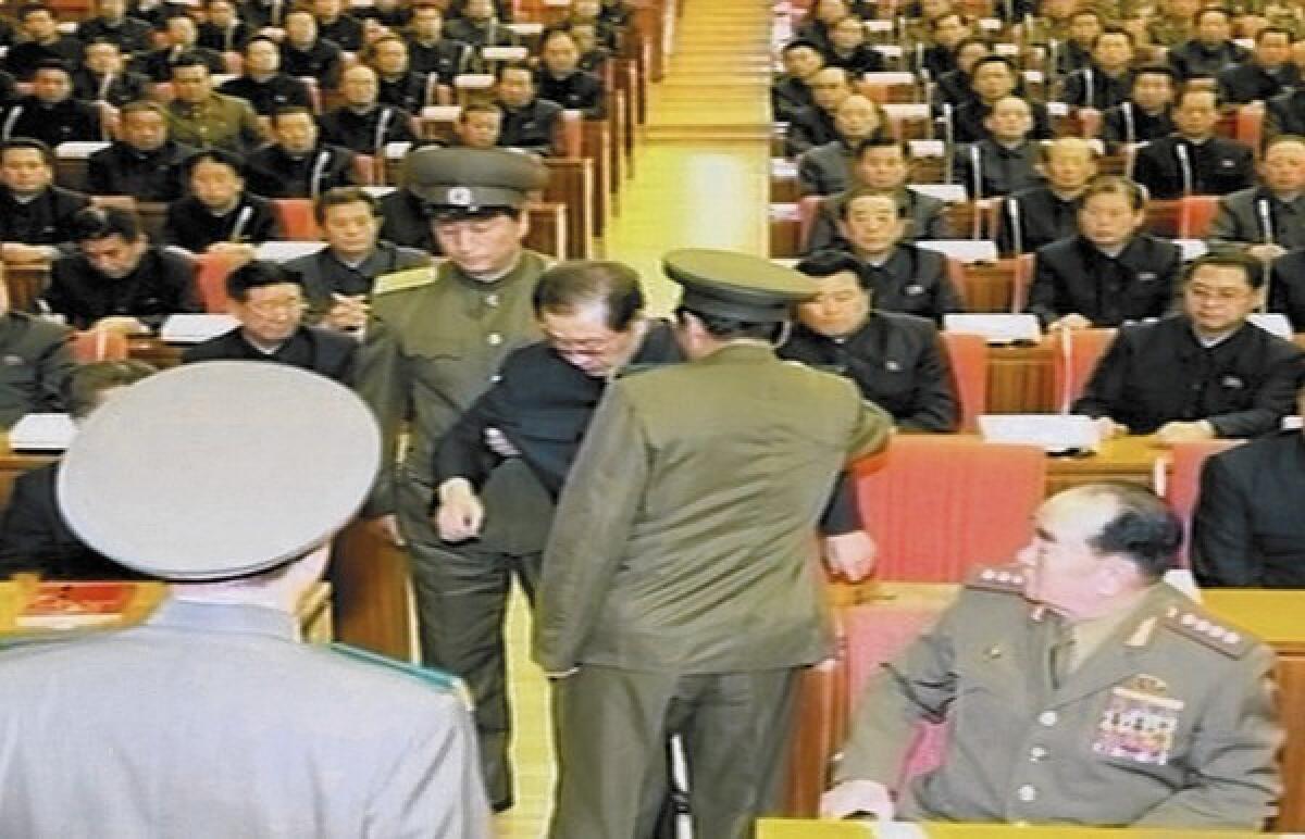Jang Song Taek is seen in an image from North Korean state television being yanked from his seat and ousted from a special session of the ruling Workers’ Party. Until recently, Jang was considered the nation's second-in-command.