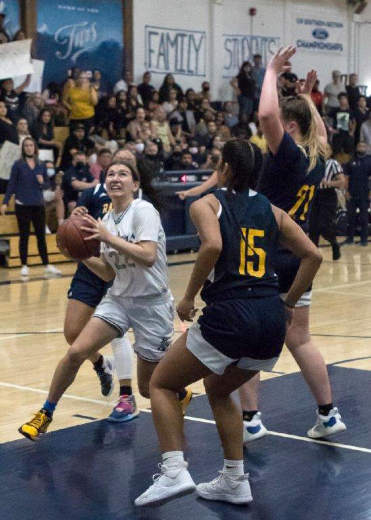 Newport Harbor's Chase Dionio (22) in the CIF Southern Section Division 4A girls' basketball championship game.