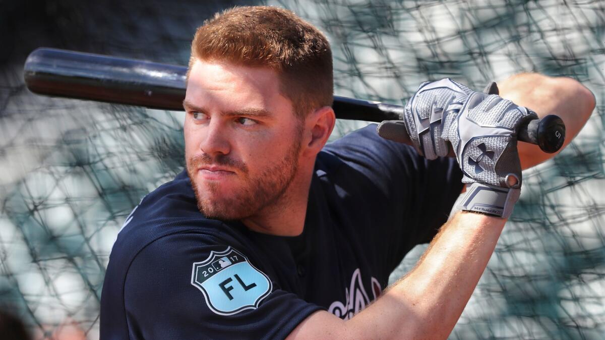 Atlanta first baseman Freddie Freeman takes batting practice on Feb. 20 in Lake Buena Vista, Fla.